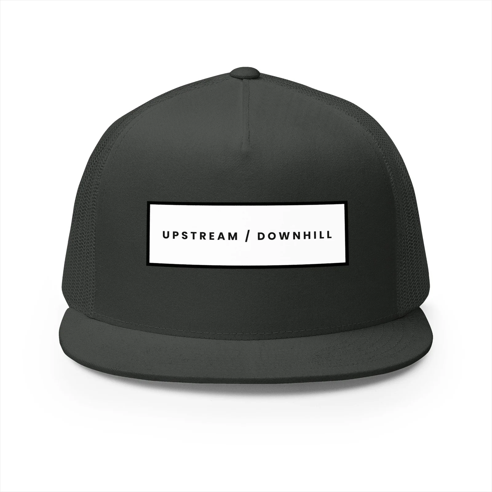 Charcoal trucker hat with a white Upstream / Downhill wordmark patch on the front